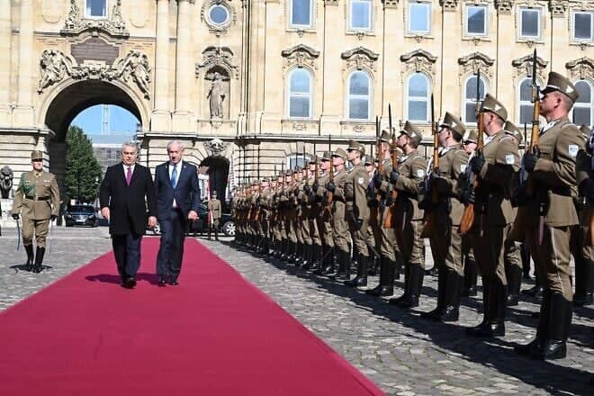 Hungarian Prime Minister Viktor Orbán and Israeli Prime Minister Benjamin Netanyahu review an honor guard in Budapest on April 3, 2025. Photo by Avi Ohayon/GPO.