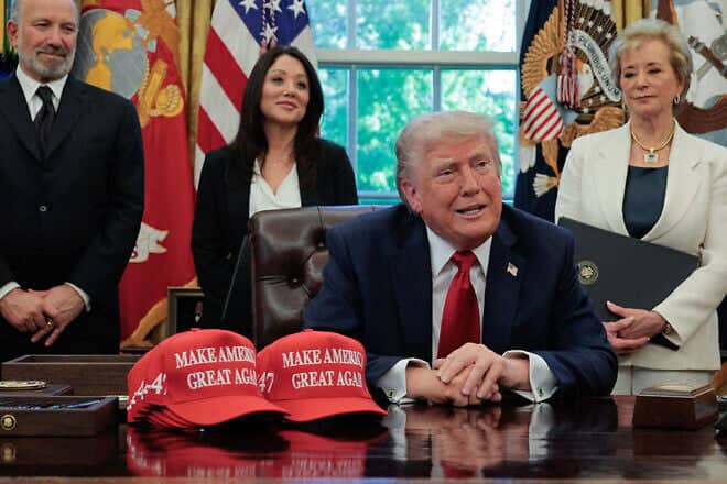 U.S. President Donald Trump speaks to reporters after signing executive orders in the Oval Office at the White House, including one obligating universities to disclose foreign gifts, on April 23, 2025. Photo by Chip Somodevilla/Getty Images.