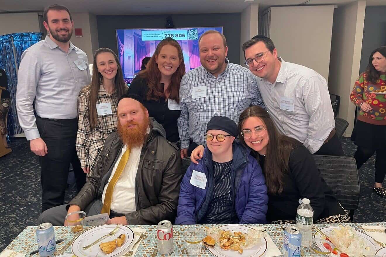 At the Met at Yachad dinner are, from left, Josh and Sammi Aranoff; Rena and Avi Kirshtein; and Betzalel Rosenwasser. Front row: Chaim and Tamar Goldman, and Lani Rosenwasser. Credit: Courtesy of Yachad.
