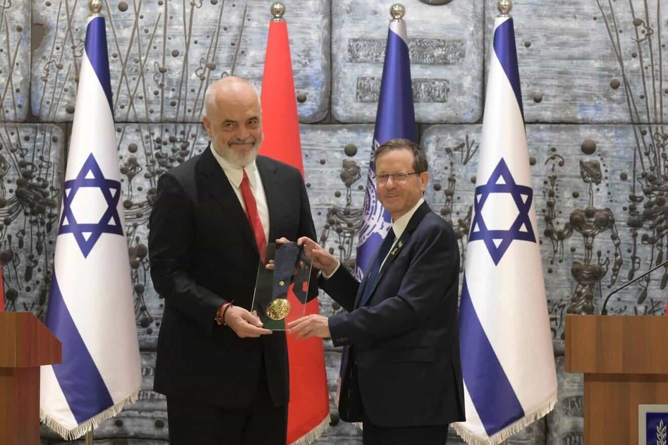 President Isaac Herzog (right) presents the Israeli Presidential Medal of Honor to Albanian Prime Minister Edi Rama, at the President's Residence in Jerusalem, April 6, 2025. Photo by Amos Ben-Gershom/GPO.