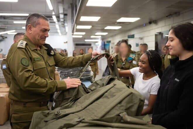 Israel Defense Forces Chief of Staff Lt. Gen. Eyal Zamir provides army kit to field observer recruits at the Tel Hashomer induction base in Ramat Gan, April 6, 2025. Credit: IDF.