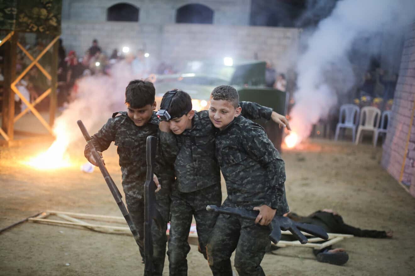 Children affiliated with Hamas in Gaza City act out the breaking through of the border with Israel and taking over a military post on Sept. 1, 2019. Photo by Hassan Jedi/Flash90.