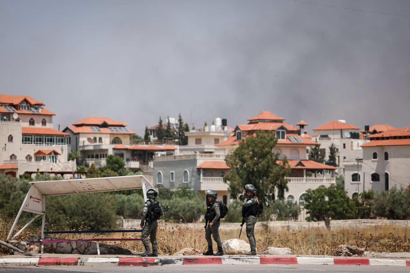 Israeli soldiers at the entrance to the Samaria village of Turmus Ayya, June 21, 2023. Photo by Yonatan Sindel/Flash90.