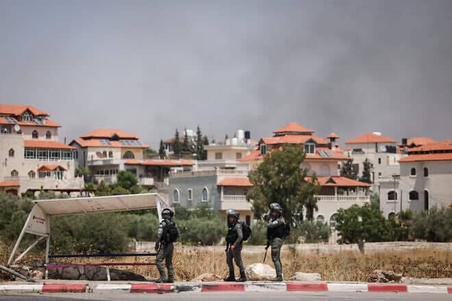 Israeli soldiers at the entrance to the Samaria village of Turmus Ayya, June 21, 2023. Photo by Yonatan Sindel/Flash90.