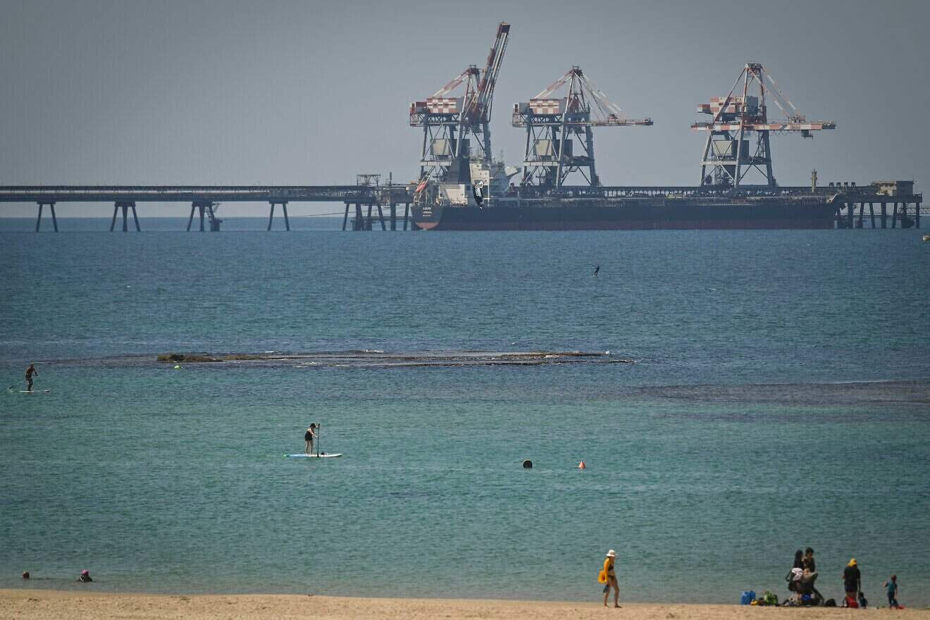 Israelis enjoy a sunny day at the beach north of the Hadera powerplant, near Kibbutz Sdot Yam, Sept. 12, 2024. Photo by Michael Giladi/Flash90.