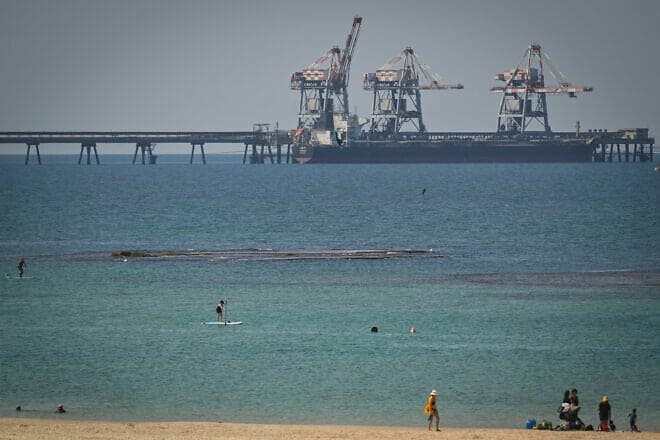 Israelis enjoy a sunny day at the beach north of the Hadera powerplant, near Kibbutz Sdot Yam, Sept. 12, 2024. Photo by Michael Giladi/Flash90.