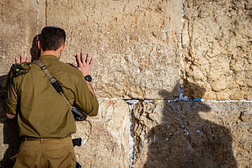 Israeli soldiers and haredi Jews at the Western Wall on Jan. 19, 2025. Photo by Noam Revkin Fenton/Flash90