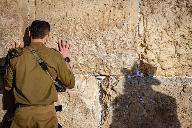 Israeli soldiers and haredi Jews at the Western Wall on Jan. 19, 2025. Photo by Noam Revkin Fenton/Flash90.