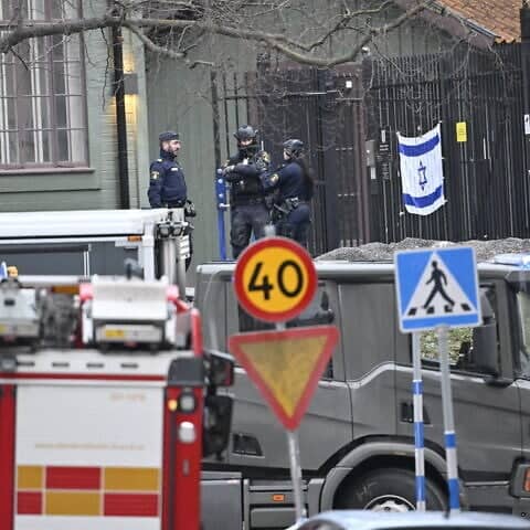 Police officers are seen outside the Israeli embassy in Stockholm, January 31, 2024. A hand grenade was found near the Israeli embassy in Stockholm, Sweden on Wednesday, the explosive device was destroyed by the National Bomb Squad. Photo by Henrik Montgomery/TT News Agency/AFP via Getty Images.