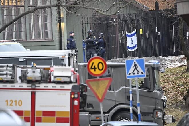 Police officers are seen after a hand grenade was found near the Israeli embassy in Stockholm, Sweden, on Jan. 31, 2024. Photo by Henrik Montgomery/TT News Agency/AFP via Getty Images.