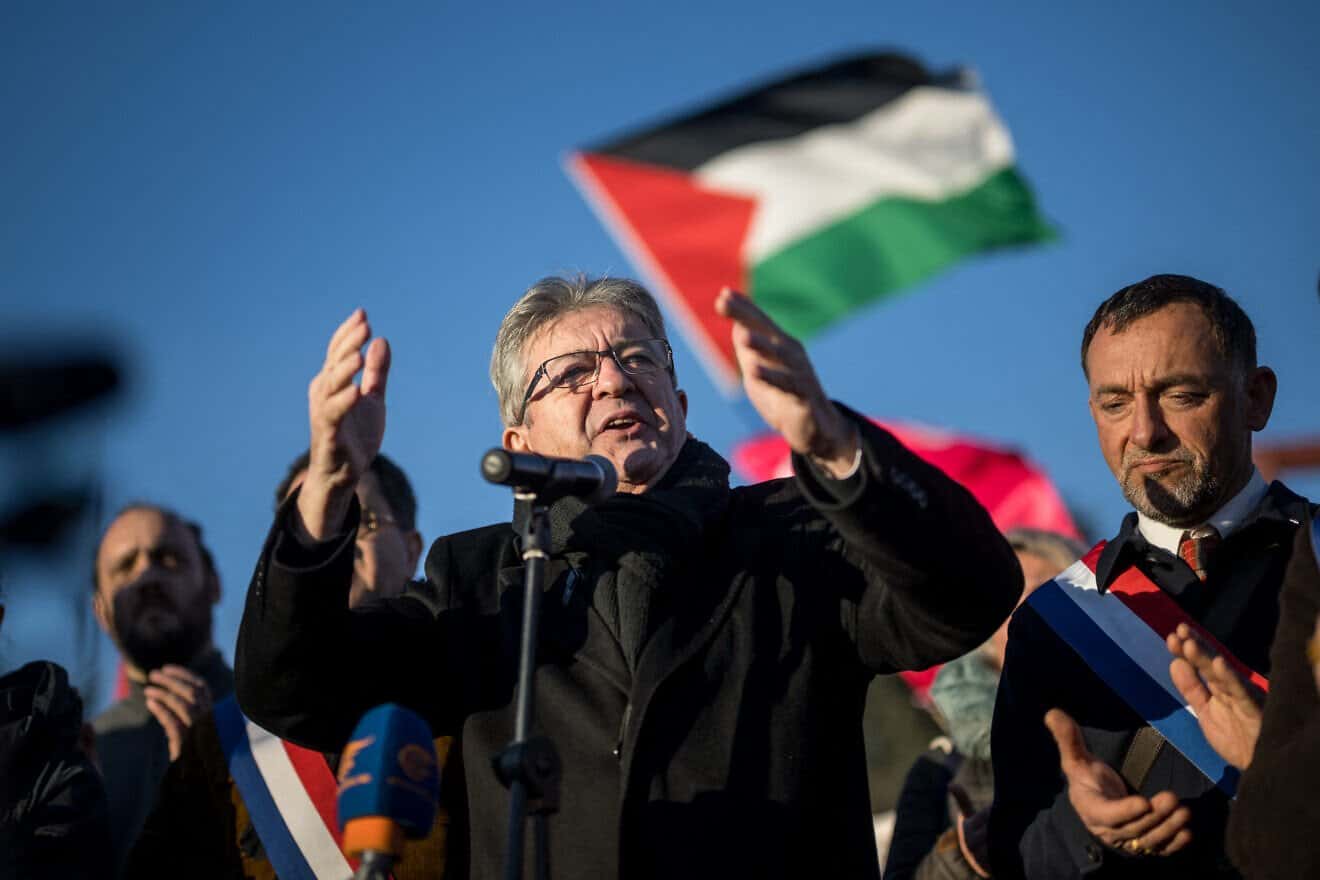 French Founder of La France Insoumise (LFI) party Jean-Luc Melenchon (C) gestures as he addresses a speech next to French LFI member of Parliament Jean-Francois Coulomme (R) at a demonstration for a cease-fire in Gaza and in solidarity with the Palestinian people in front of the United Nations Offices in Geneva on Feb. 3, 2024. Photo by Fabrice Coffrini/AFP via Getty Images.