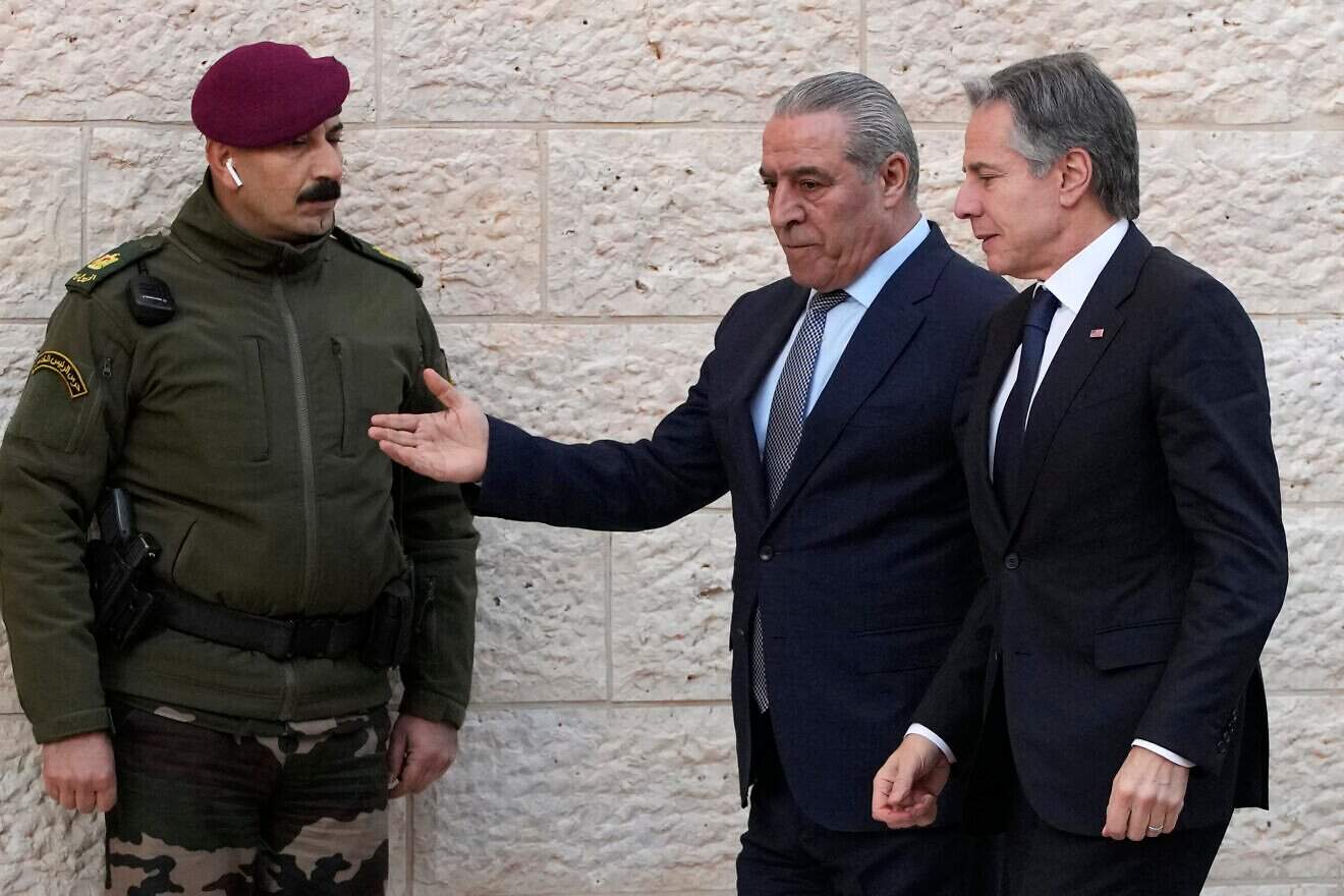 U.S. Secretary of State Antony Blinken (right) is welcomed by PLO Secretary General Hussein al-Sheikh (center) as he arrives to meet with Palestinian President Mahmoud Abbas (not pictured) in the West Bank city of Ramallah, on Feb. 7, 2024. Photo by Mark Schiefelbein/POOL/AFP via Getty Images.