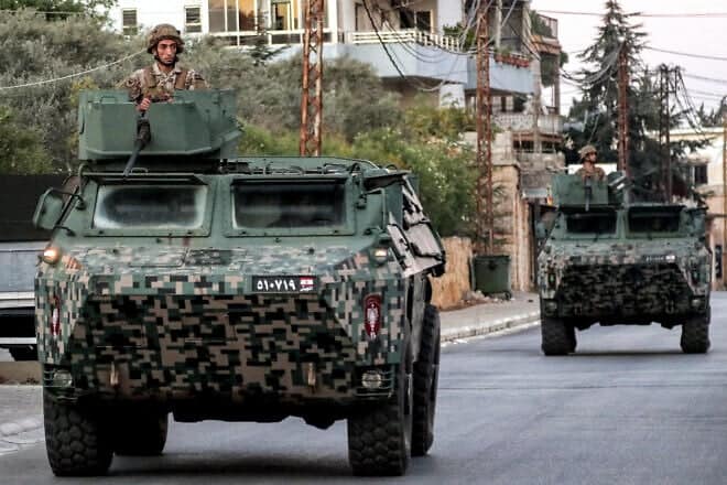 Lebanese Army vehicles patrol the area of Marjayoun in southern Lebanon near the border with Israel on Oct. 25, 2024. Photo by AFP via Getty Images.