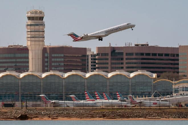 An American Eagle regional jet takes off over the American Airlines terminal at Reagan Washington National Airport in Arlington, Va., on March 23, 2025. Photo by J. David Ake/Getty Images.