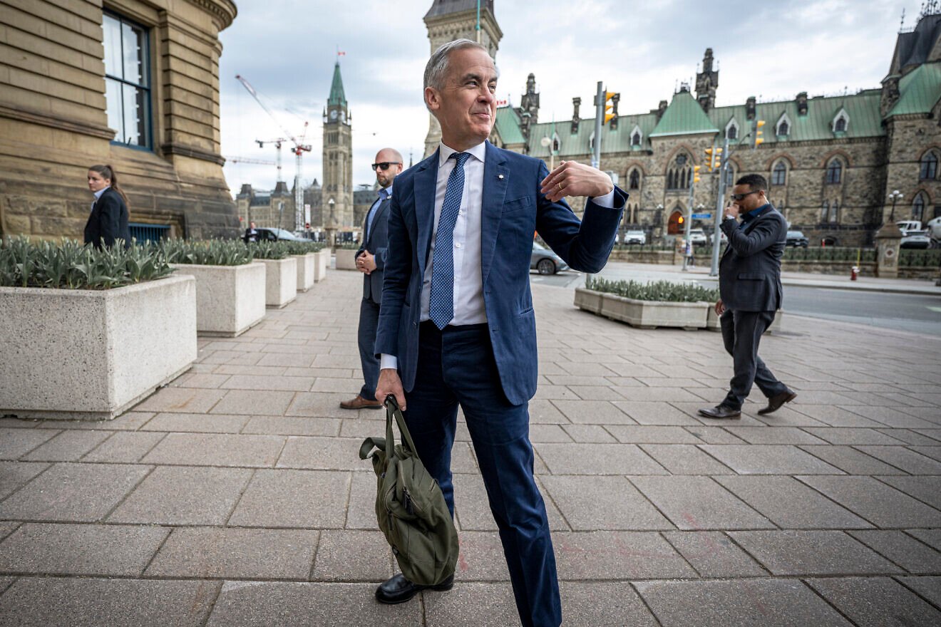 Canadian Prime Minister Mark Carney arrives at the Office of the Prime Minister and Privy Council in Ottawa the morning after the Liberal Party of Canada won the federal elections on April 29, 2025. Credot" Andrej Ivanov/Getty Images.