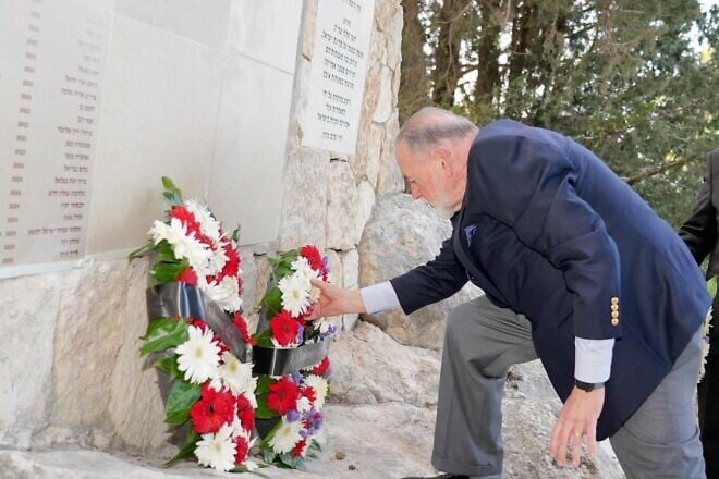 U.S. Ambassador to Israel Mike Huckabee lays a wreath at a ceremony honoring American victims of the Oct. 7, 2023 Hamas massacre, April 27, 2025. Source: X/@USAmbIsrael.