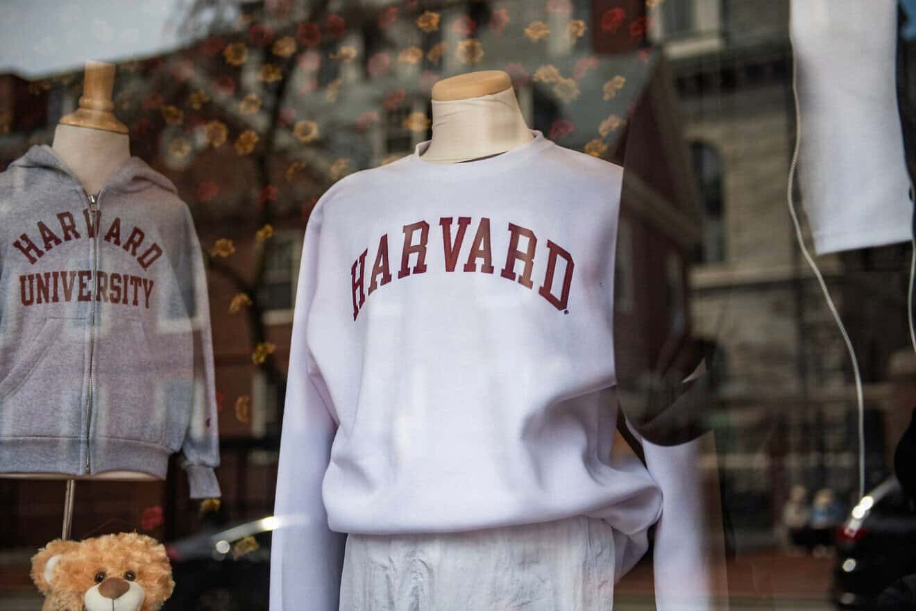 Harvard University sweatshirts are displayed for sale in a school store window on its campus in Cambridge, Mass., on April 15, 2025. Photo by Joseph Prezioso/AFP via Getty Images.