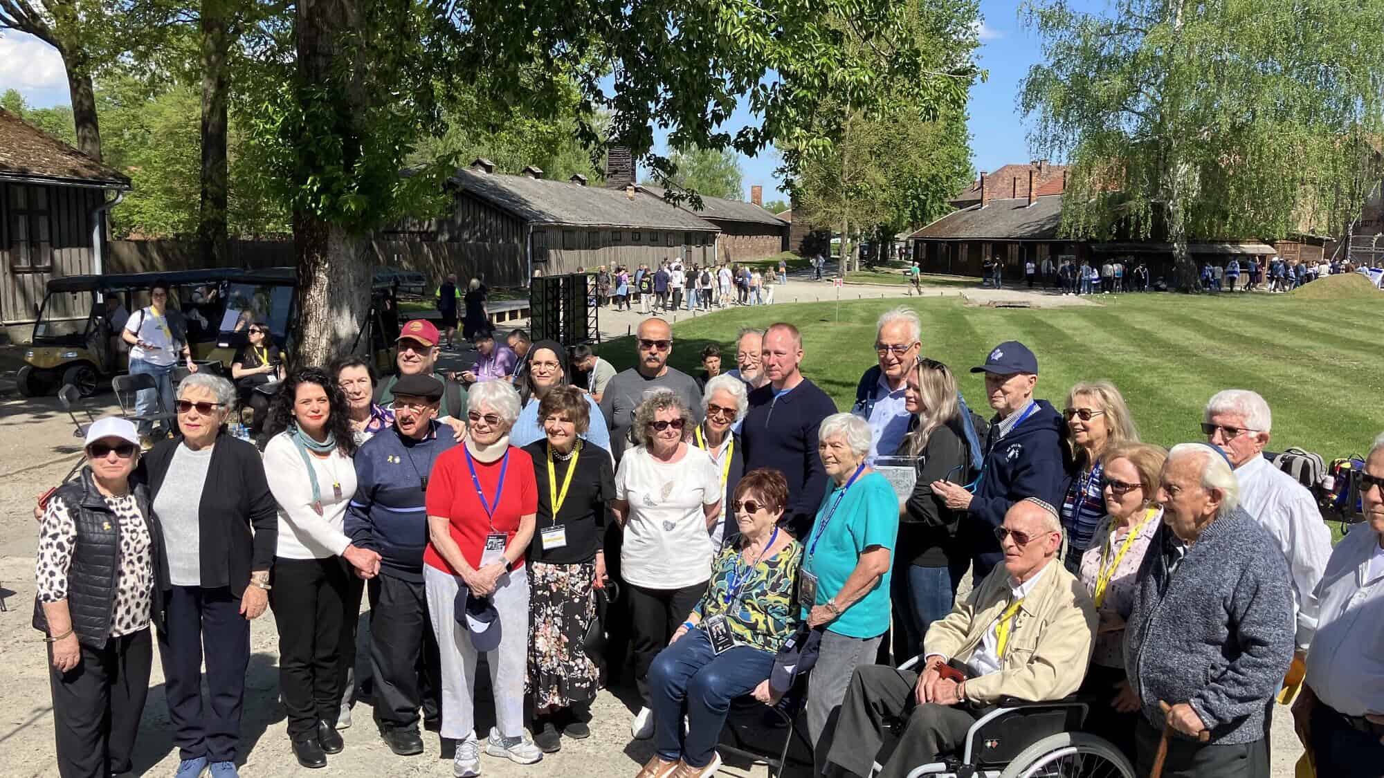 Holocaust survivors at Auschwitz, 80 years after it was liberated, with Merrill Eisenhower, the great-grandson of U.S. Gen. Dwight D. Eisenhower, on April 23, 2025. Photo by Etgar Lefkovits.