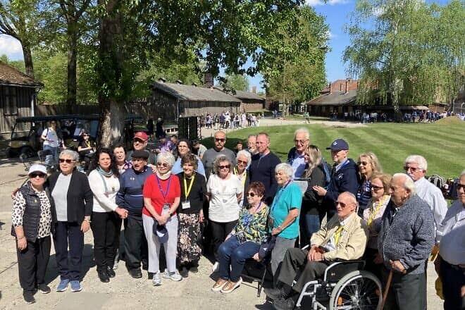 Holocaust survivors at Auschwitz, 80 years after it was liberated, with Merrill Eisenhower, the great-grandson of U.S. Gen. Dwight D. Eisenhower, on April 23, 2025. Photo by Etgar Lefkovits.