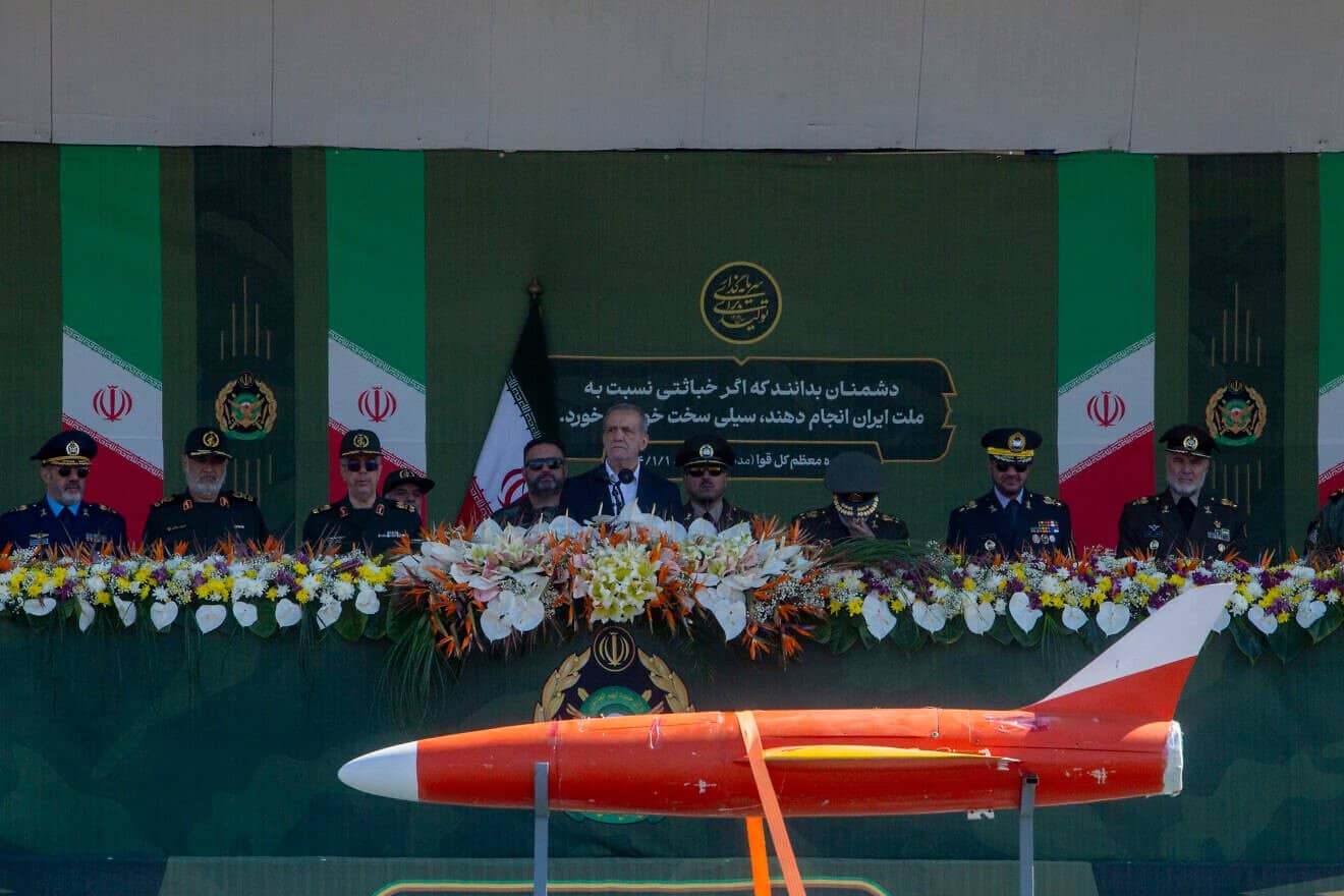 Iran's President Masoud Pezeshkian watches a military parade during a ceremony marking the country's annual Army Day on April 18, 2025 in Tehran. Photo by Majid Saeedi/Getty Images.