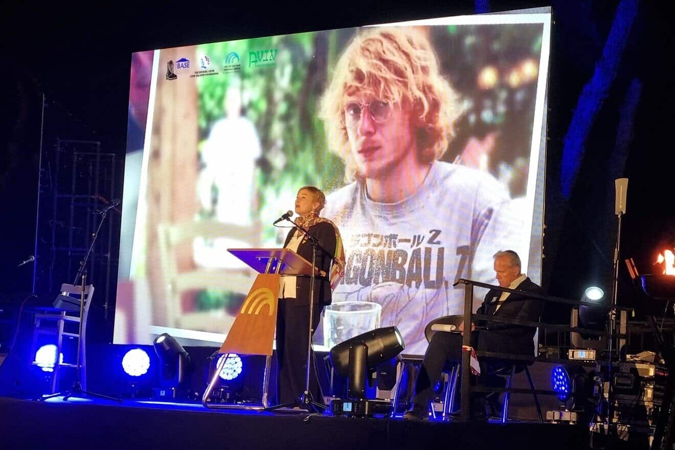 Iris Haim, the mother of  Yotam Haim, addresses the Yom Hazikaron ceremony on Ammunition Hill, April 29, 2025. Photo by Sharon Altshul.