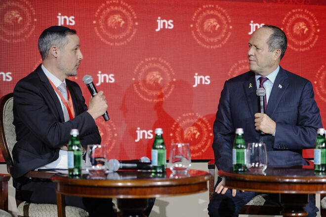 Israeli Minister of Economy and Industry Nir Barkat (right) in conversation with JNS CEO Alex Traiman at the inaugural JNS International Policy Summit in Jerusalem, April 28, 2025. Photo by Shahar Yurman.