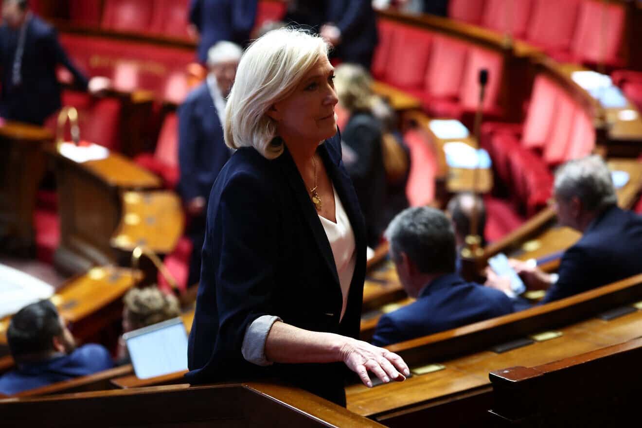 Marine Le Pen, president of Rassemblement National parliamentary group, arrives at a session of questions to the government at the National Assembly, France's lower house parliament, in Paris on April 1, 2025. Photo by Anne-Christine Poujoulat/AFP via Getty Images.