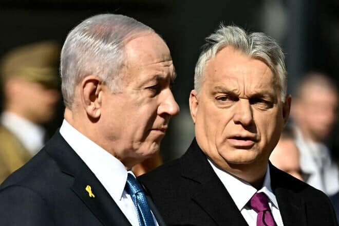 Israeli Prime Minister Benjamin Netanyahu and Hungary's Prime Minister Viktor Orban review a military honor guard in Budapest on April 3, 2025. Photo by Attila Kisbenedek/AFP via Getty Images.