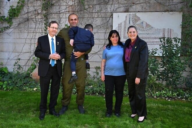 Israeli President Isaac Herzog marks World Autism Awareness Day by welcoming an IDF reserve soldier, his wife and two children who are on the autism spectrum to his official residence in Jerusalem, April 2, 2025. Photo by Haim Zach/GPO.
