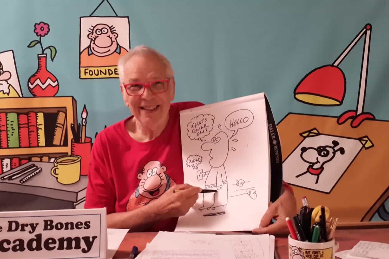 Yaakov Kirschen at the drawing board. Photo by Sali Ariel.