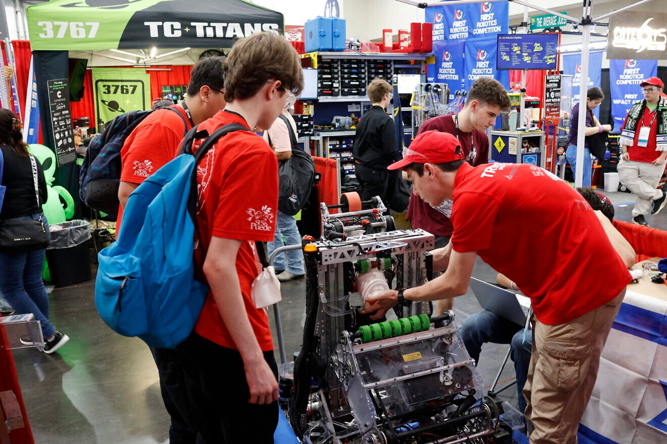 The Trigon robotics team at the FIRST Championship in Houston on April 18, 2025. Credit: Courtesy of Trigon Group.