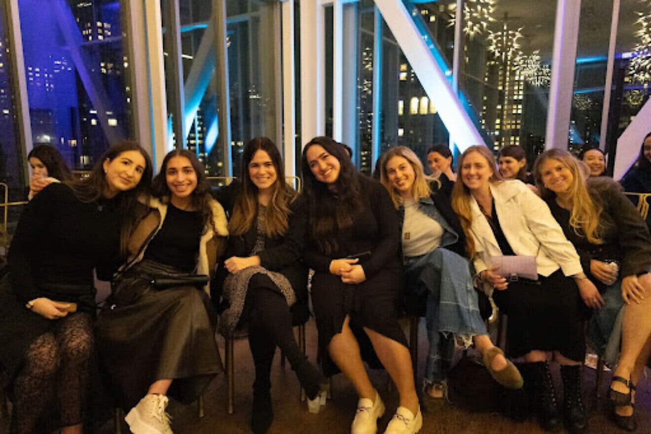 Young professionals share a moment of connection at ECP’s Women Unight-Kumzitz Connection Cocktail Hour. Credit: Courtesy.