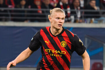 Erling Haaland plays for Manchester City against RB Leipzig in a UEFA Champions League match at the Red Bull Arena, Leipzig, Germany, on Feb. 22, 2023. Photo by Jacek Stanislawek/Wikimedia Commons.