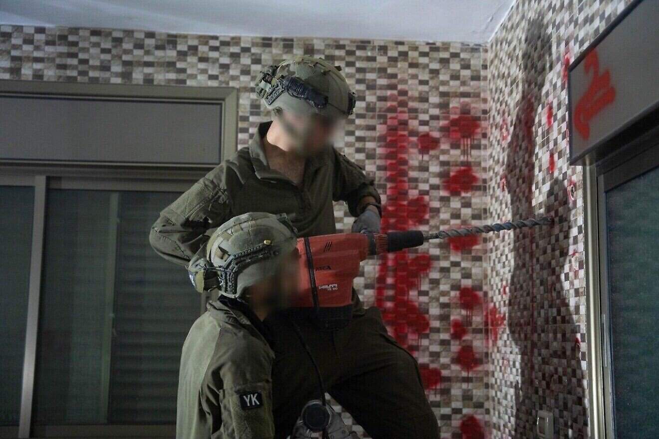 Israeli forces prepare the Deir Ibzi’a home of terrorist Mujahid Mansour for demolition on April 8, 2025. Credit: IDF.
