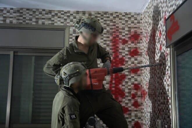 Israeli forces prepare the Deir Ibzi’a home of terrorist Mujahid Mansour for demolition on April 8, 2025. Credit: IDF.
