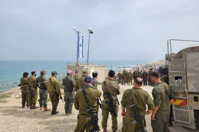 Israeli soldiers standing for two minutes of silence to commemorate Holocaust Remembrance Day, April 24, 2025. Credit: IDF.