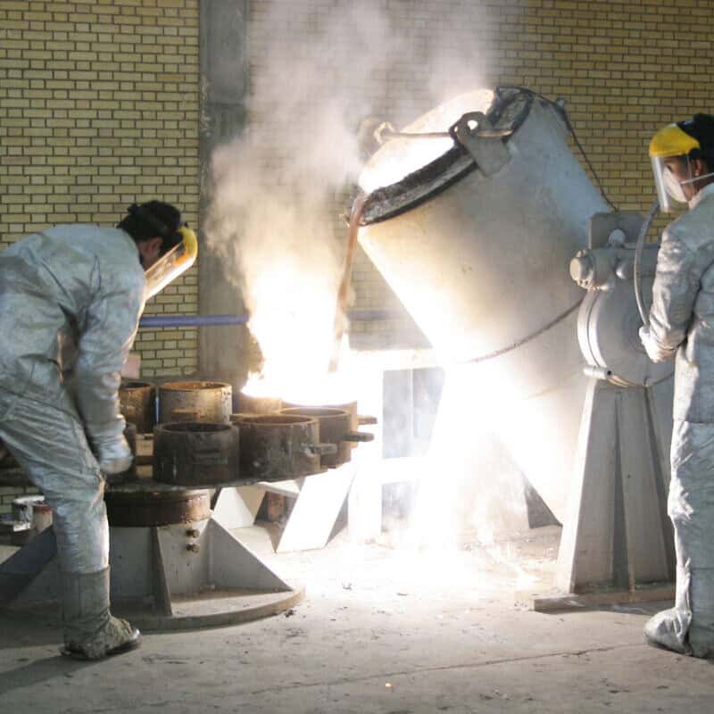 Technicians work inside a uranium conversion facility producing unit just outside Isfahan, Iran, March 30, 2005. Photo by Getty Images.