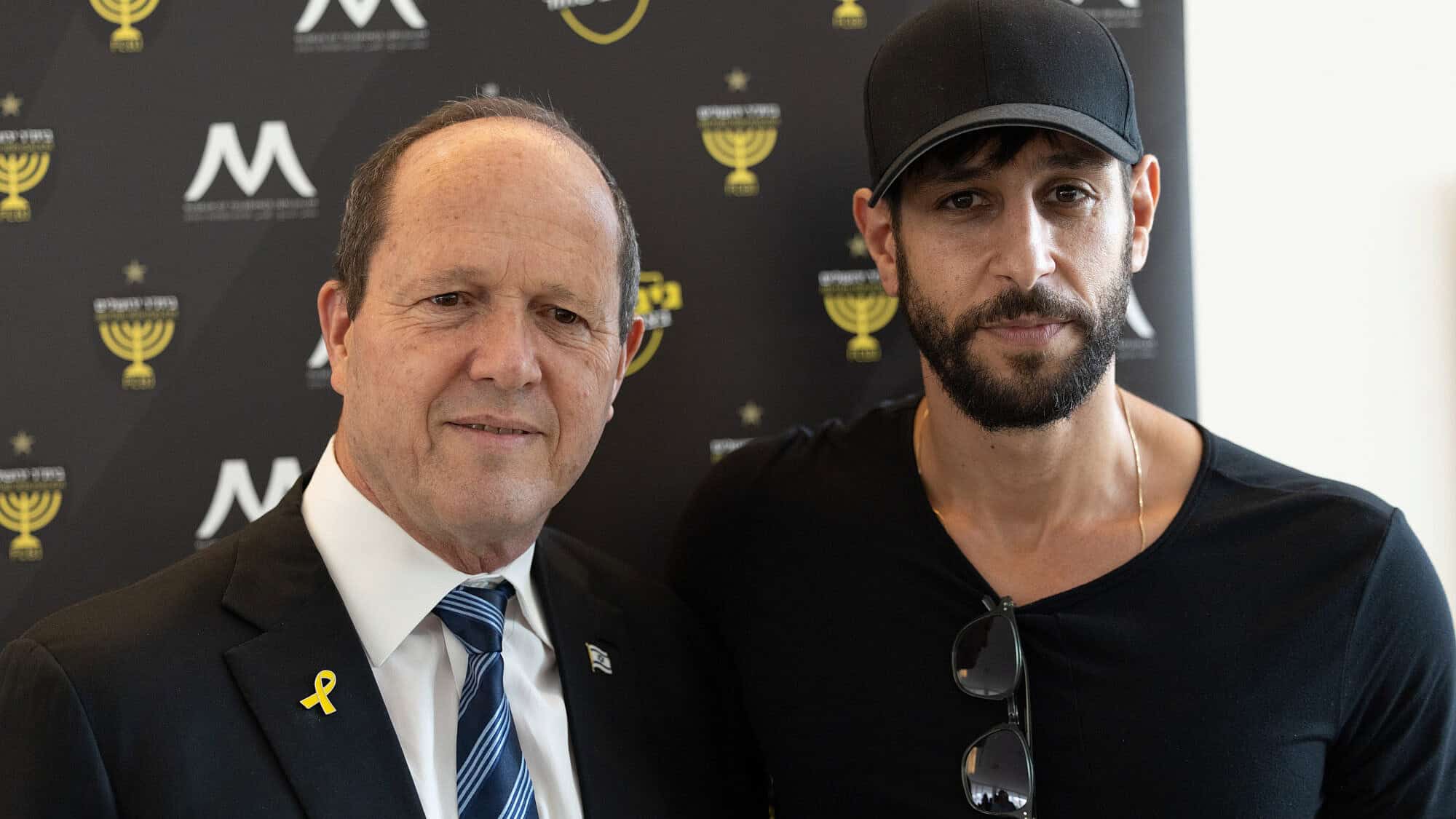 Idan Amedi (right) poses with Economy and Industry Minister Nir Barkat at the Museum of Tolerance Jerusalem. Photo by Tzachi Kraus.