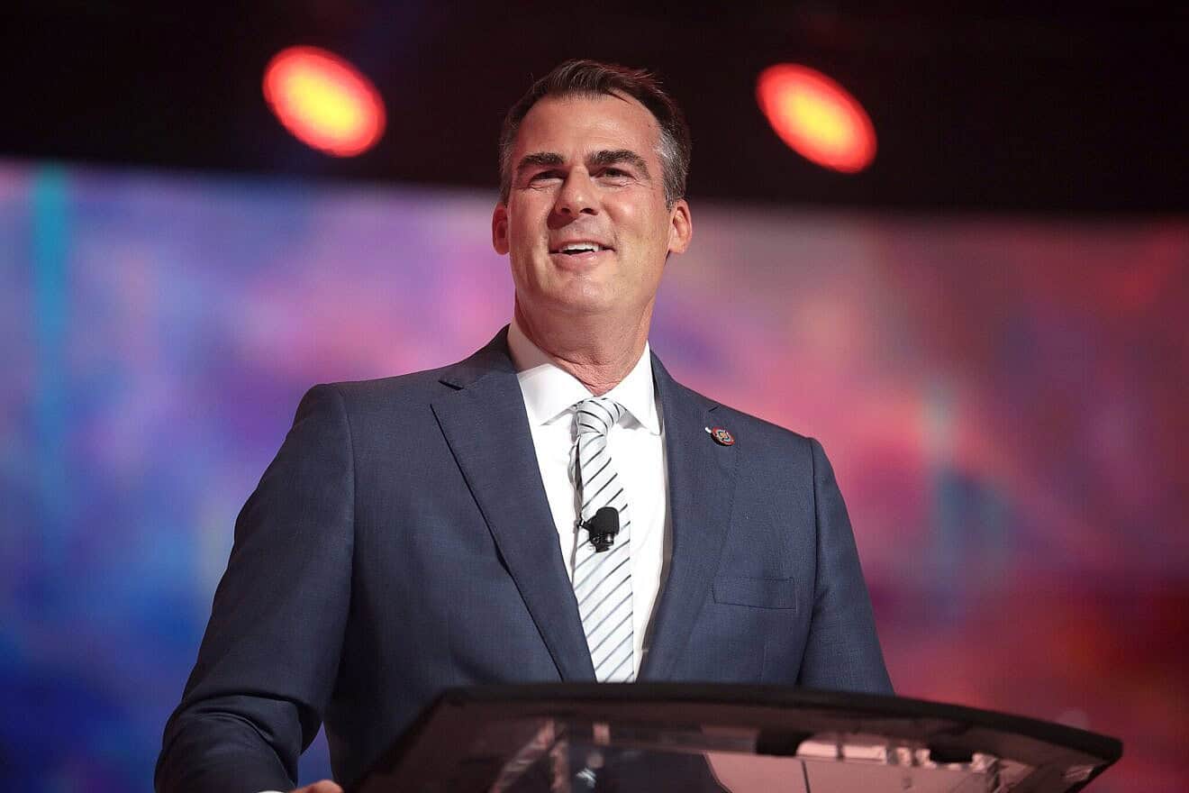 Oklahoma Gov. Kevin Stitt speaking with attendees at the 2022 Student Action Summit at the Tampa Convention Center in Tampa, Fla., July 24, 2022. Credit: Gage Skidmore via Wikimedia Commons.