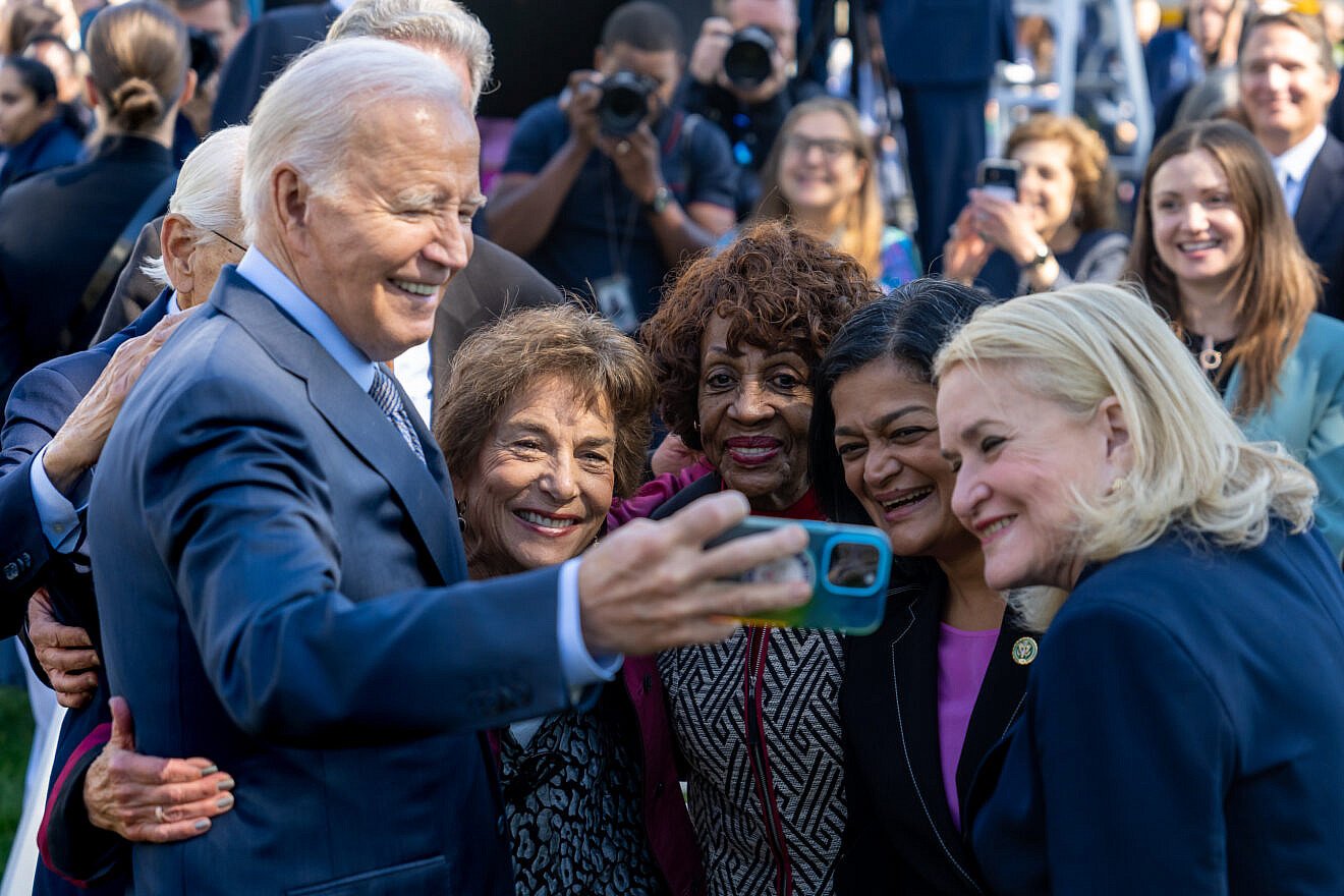 U.S. President Joe Biden poses with (from left) Reps. Jan Schakowsky (D-Ill.), Maxine Waters (D-Calif.), Pramila Jayapal (D-Wash.) and Sylvia Garcia (D-Texas), on Oct. 11, 2023, in the White House Rose Garden. Credit: Adam Schultz/White House.