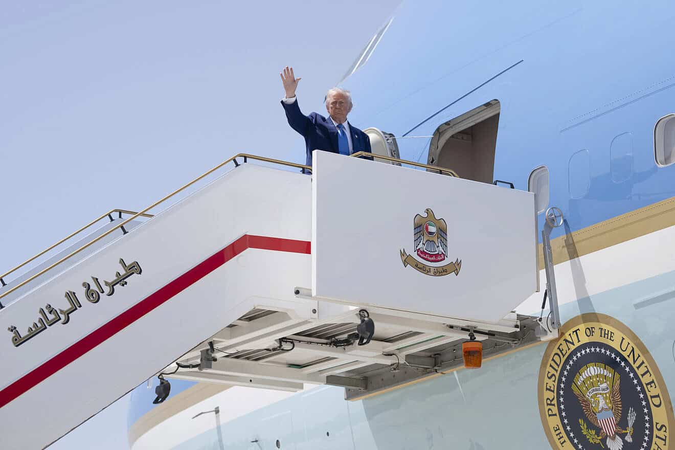 U.S. President Donald Trump waves while boarding Air Force One at Abu Dhabi International Airport in Abu Dhabi, United Arab Emirates, May 16, 2025. Credit: Molly Riley/White House.