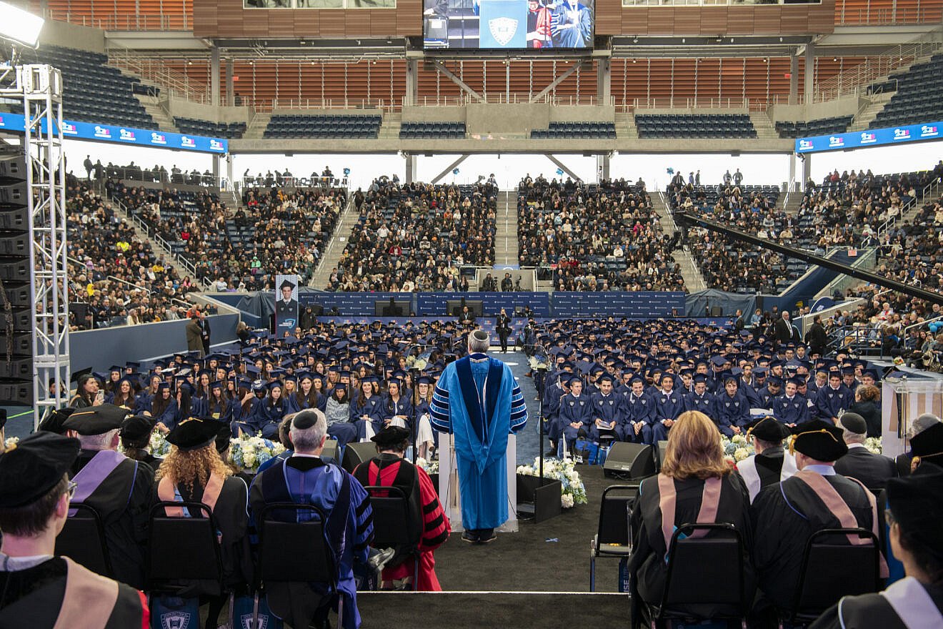 Rabbi Ari Berman, the president of Yeshiva University, speaks at the school's 2025 commencement at Louis Armstrong Stadium, at the Billie Jean King National Tennis Center, in Queens, May 22, 2025. Credit: Yeshiva University.