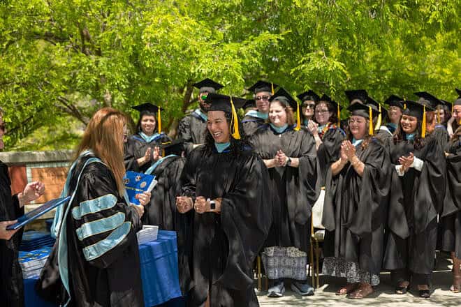 Students celebrate a graduation their master’s in education in early childhood education from American Jewish University’s Masor School for Jewish Education and Leadership on May 18, 2025. Photo by Roland Stone.