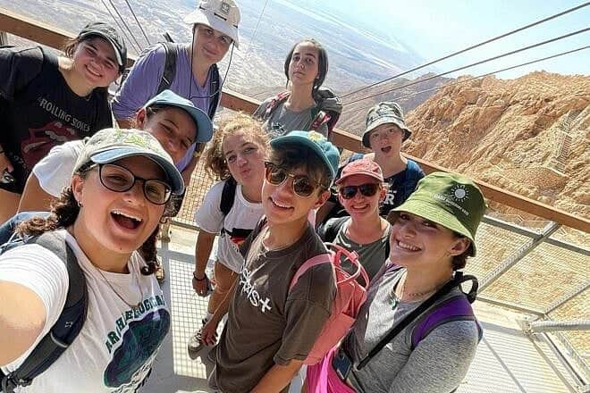 Alana Slade (second from right in pink cap) with friends from the Alexander Muss High School in Israel program. Credit: Jewish National Fund-USA.