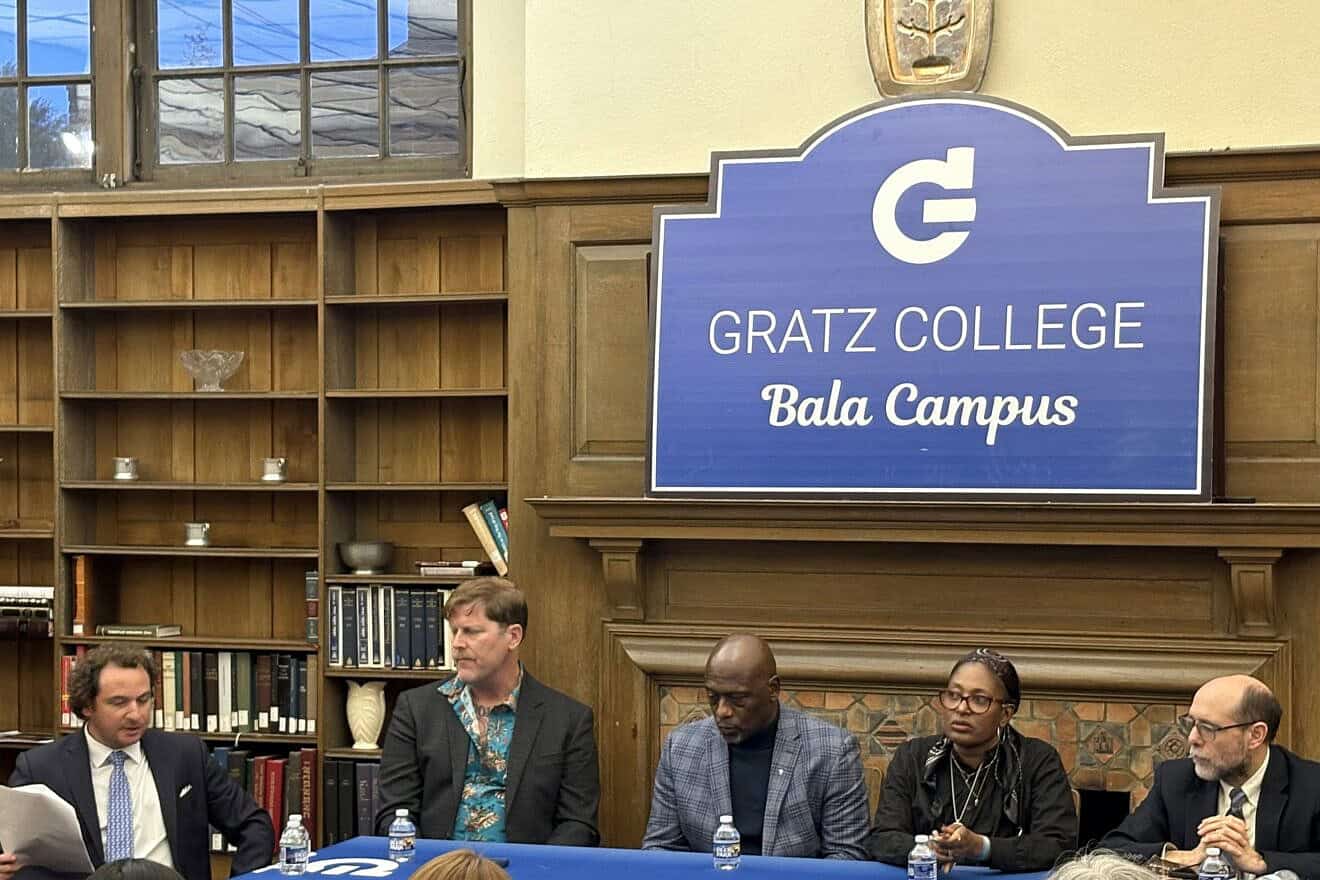 From left: Panel moderator Ayal Feinberg, director of the Center for Holocaust Studies and Human Rights at Gratz College outside Philadelphia; former neo-Nazi Arno Michaelis, Johnny Shelton, team chaplain and spiritual adviser for the Baltimore Ravens; Stacey Aviva Flint, director of education and community engagement for the Jewish Federation of North America; and Robert Katz at the new headquarters of Gratz College in Bala Cynwyd, Pa., April 22, 2025. Photo by Jon Marks.