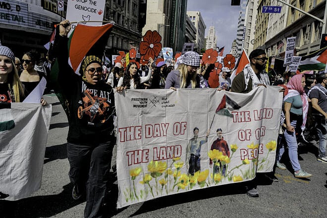 Anti-Israel protesters in Los Angeles call for an end to U.S. support of Israel, boycotts of Isral and a ceasefire that would allow Hamas to stay in the Gaza Strip, March 29, 2025. Photo by ALI MATIN/Middle East Images/AFP via Getty Images.