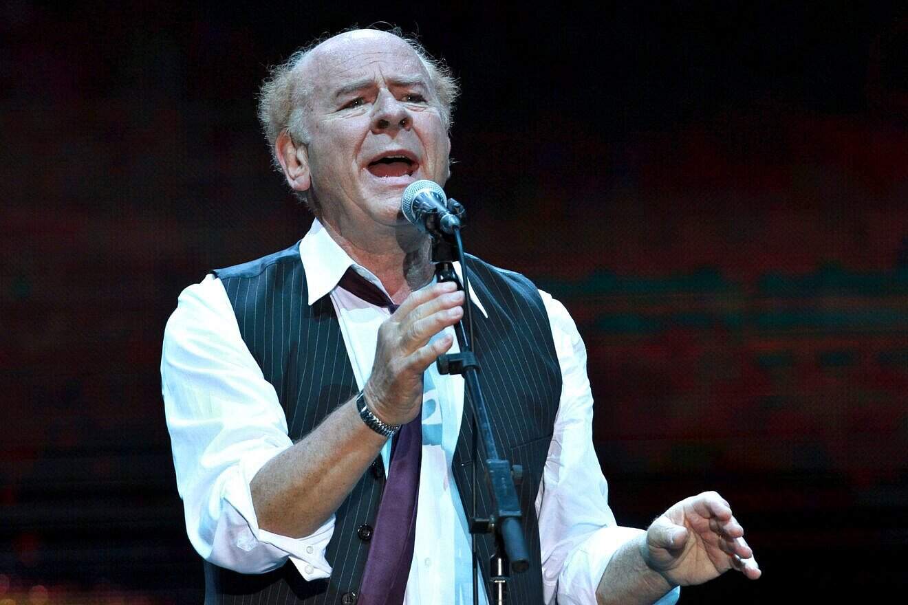 Grammy Award-winning American singer Art Garfunkel performs on stage at Bloomfield Stadium in Jaffa on June 10, 2015. Photo by Gil Cohen Magen/AFP via Getty Images.