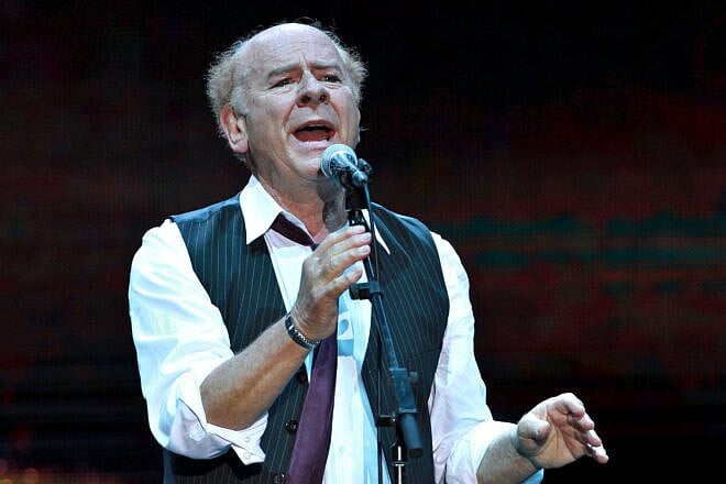 Grammy Award-winning American singer Art Garfunkel performs on stage at Bloomfield Stadium in Jaffa on June 10, 2015. Photo by Gil Cohen Magen/AFP via Getty Images.