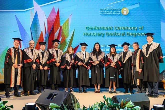 From left: At the conferment ceremony of honorary doctoral degrees at Ben-Gurion University of the Negev are university president and professor Daniel Chamovitz; Avi Nissenkorn, chair of the the school's executive board; professor Moshe Phillip; social-media star Nuseir Yassin (“Nas Daily”); professor Judith Shamian; Sami Sagol; Nicole Krauss; Zoya Cherkassky; Andrey Makarevich; university rector and professor Chaim Hames; and chair of the university's board of governors and Americans for Ben-Gurion University board member Lloyd Goldman, May 13, 2025. Credit: Courtesy of BGU.