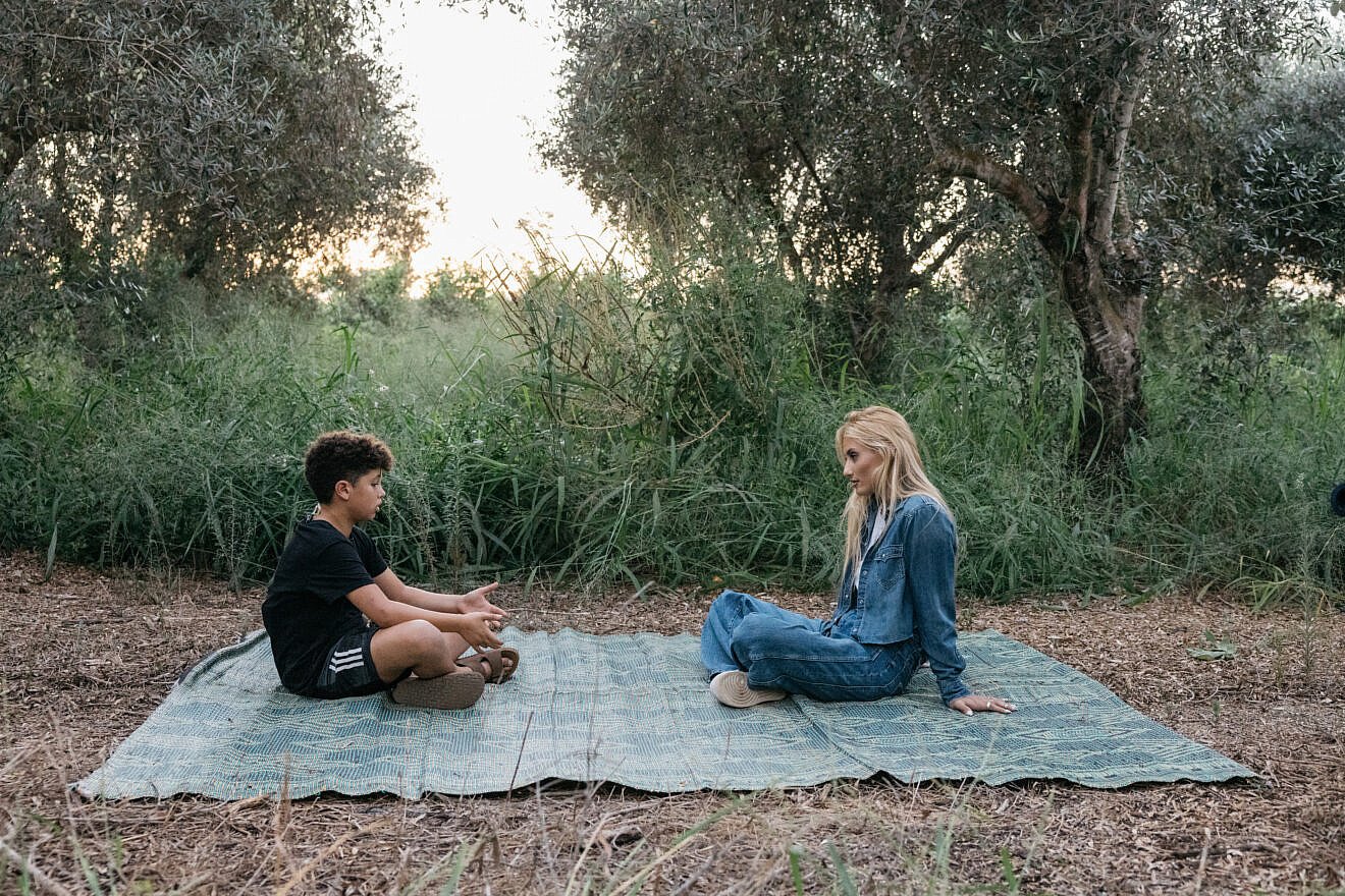Amit Cohen and Montana Tucker in "The Children of October 7" (2025). Credit: Orit Pnini/Courtesy.